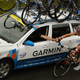 A rider clasps the hand of a support car driver during the Tour of Britain as it passes up the Mennock pass, the highest climb in the race at 1380 feet above sea level, on September 13, 2008 in Wanlockhead, Scotland. Getty Images